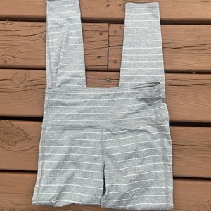 ATHLETA size small grey with white stripped leggings